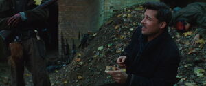 Aldo Raine sniffs some tobacco