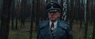 Hans Landa looks at Aldo Raine scared