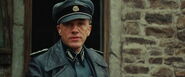 Hans Landa watches Shoshanna running.