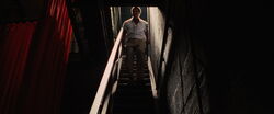 Marcel on stairs with with crowbars.jpg