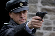 Christoph Waltz points an Walter P38