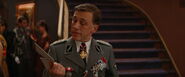 Hans Landa looks at Donny and Omar's tickets