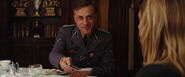 Hans Landa offers Shosanna German cigarettes