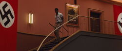 Marcel in the lobby with iron bars.jpg