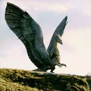 Saphira rearing and flaring her wings