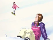 Sayuki snowboarding alongside Mako