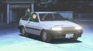 Itsuki waving inside his AE85