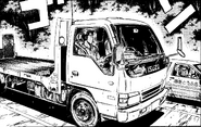 A 1993 Isuzu Elf in Chapter 108, driven by Bunta Fujiwara in order to collect the Eight Six