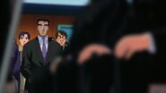 Bunta en traje durante la graduación de Takumi