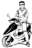 Iketani with his Honda Dio