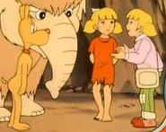 present-day Penny speaking to Cave Penny