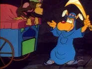 monkey watches as Brain takes back the scimitar