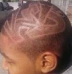 Shaved designs on Kristopher's head
