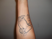 Tattoo on right forearm.