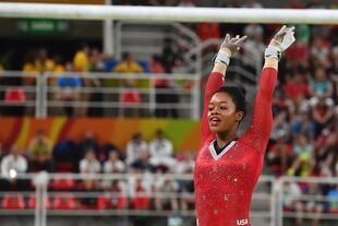 Douglas in the uneven bars final at the 2016 Olympic Games