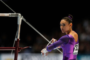 Ross in the uneven bars final at the 2013 World Artistic Gymnastics Championships