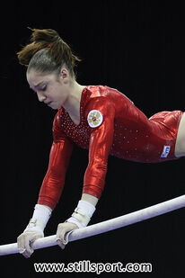 Mustafina in the uneven bars final at the 2010 European Championships