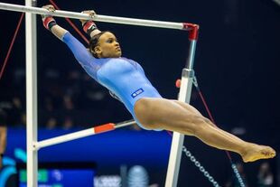 Andrade in the uneven bars final at the 2022 World Championships