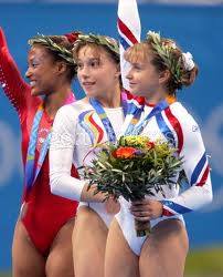 Pavlova (front) with her Olympic Vault bronze medal