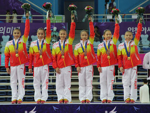 Chen (second from right) with her team and Asian Games team gold medal