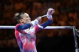 Fenton in the uneven bars final at the 2022 European Championships