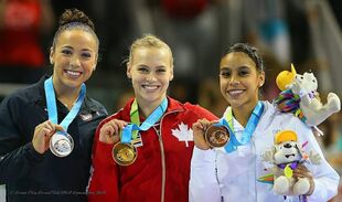 Hundley (left) with her Pan American Games floor exercise silver medal