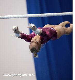 Melnikova in the uneven bars final at the 2016 Russian Cup