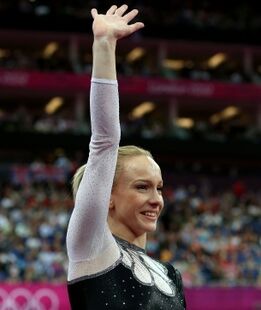 Sandra Izbaşa (ROU) waving to the crowd in the vault final