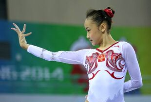 Bai in podium training at the 2014 World Championships