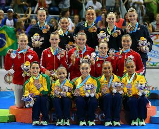 Saraiva (bottom row, second from left) with her team and Pan American Games team bronze medal