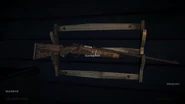 The original Pre-Alpha hunting rifle on a rack.