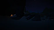 A nighttime view of the peak, with the small alcove in the background