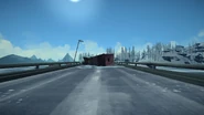 The fallen truck on the bridge
