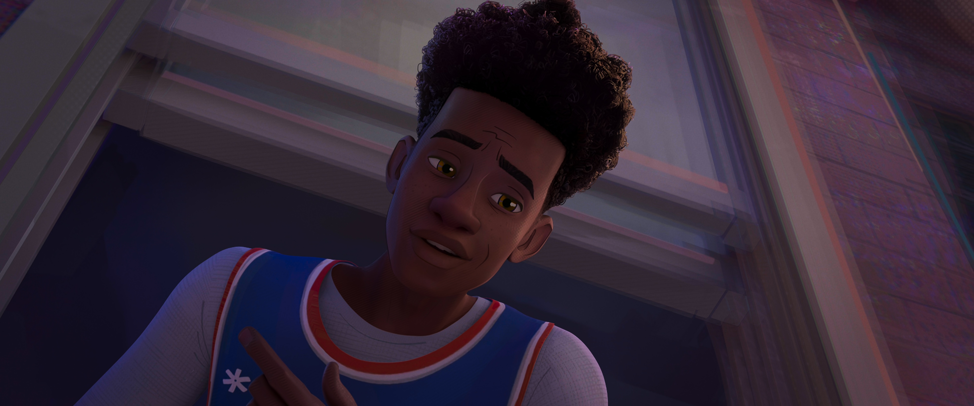 Miles Morales is the first black Spider-Man to be featured in a major film,  Spider-Man: Into the Spider-Verse. During the movie he falls off a build  landing in between the number 42.