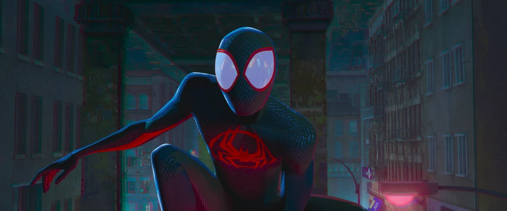 Miles Morales is the first black Spider-Man to be featured in a major film,  Spider-Man: Into the Spider-Verse. During the movie he falls off a build  landing in between the number 42.