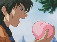 Tokajin humano comiendo la Fruta Humana