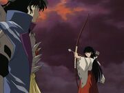 Kikyō draws her arrow against Naraku