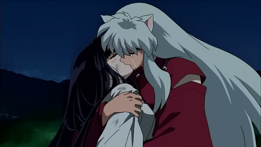 Kikyo and InuYasha embrace