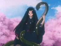 Kikyo đánh bật đòn tấn công của phù thủy bóng tối.