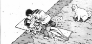 Kumi and Ippo falling on a sled