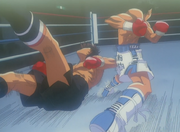 Ippo knocking down Sendo with the Dempsey Roll at the start of the match