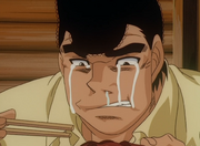 Takamura crying while eating the bear he knocked out