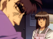 Kumi talking to Ryo before his fight against Ippo