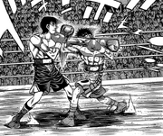 Ippo and Alfredo exchanging blows
