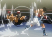 Sendo falls from Ippo's Dempsey Roll on the seventh round