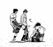 Sawamura kicking Mashiba's head while he is down