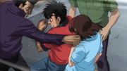 Sawamura throwing a punch at Kumi - Anime