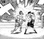 Mashiba hitting Juan with a short uppercut