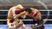 Eagle blocking Takamura's punch