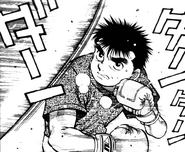 Ippo hitting the sandbag.